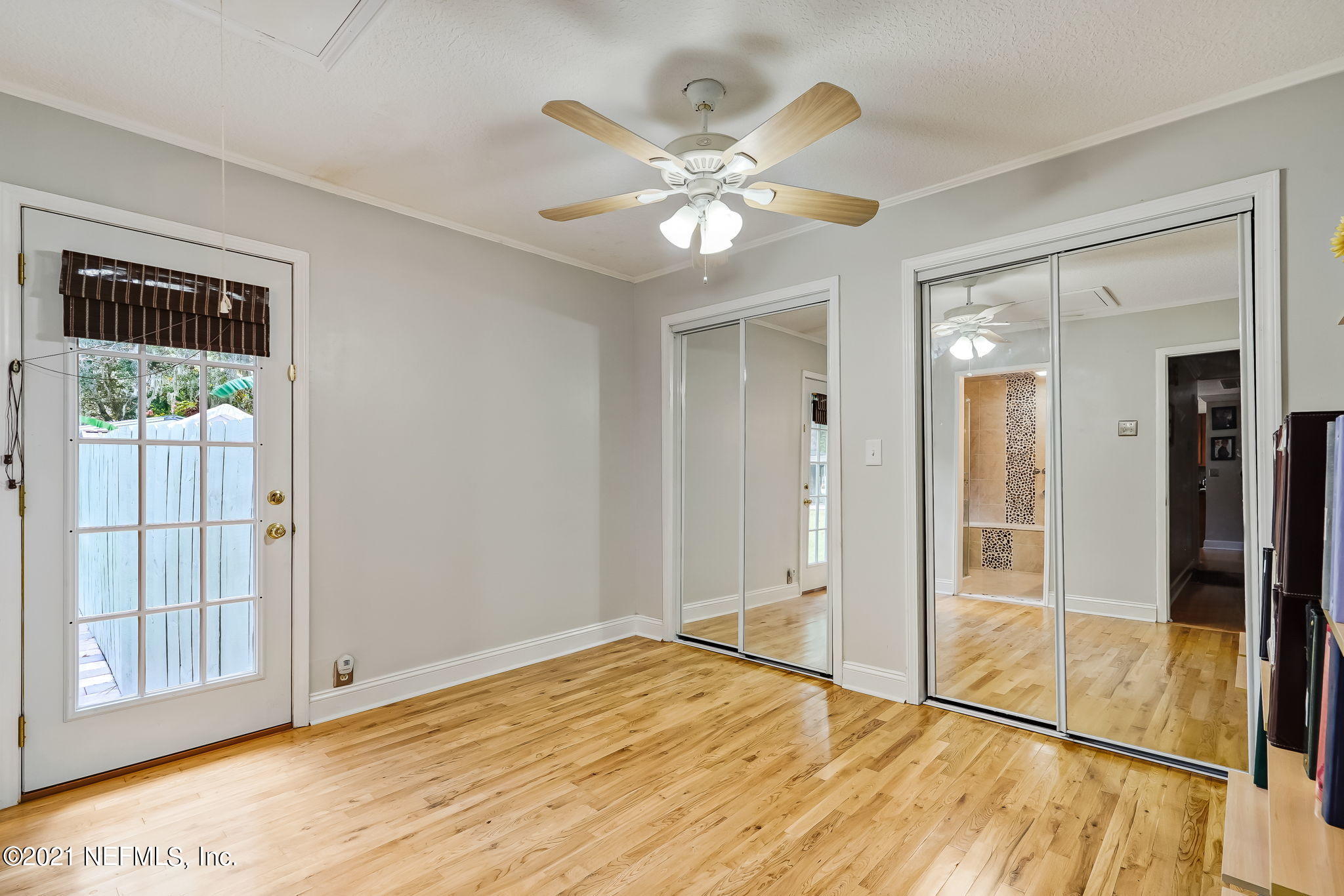 12957 Mandarin Road Jacksonville, FL 32223 - Photo 57 of 83 a view of an empty room with wooden floor