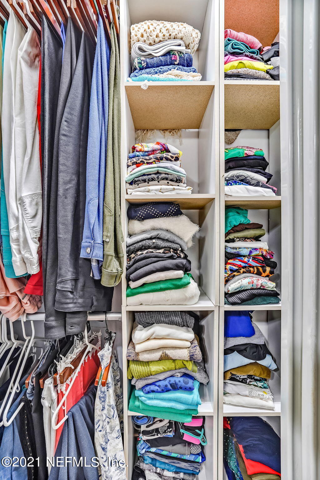 12957 Mandarin Road Jacksonville, FL 32223 - Photo 63 of 83 a view of walk in closet with clothes and shoes