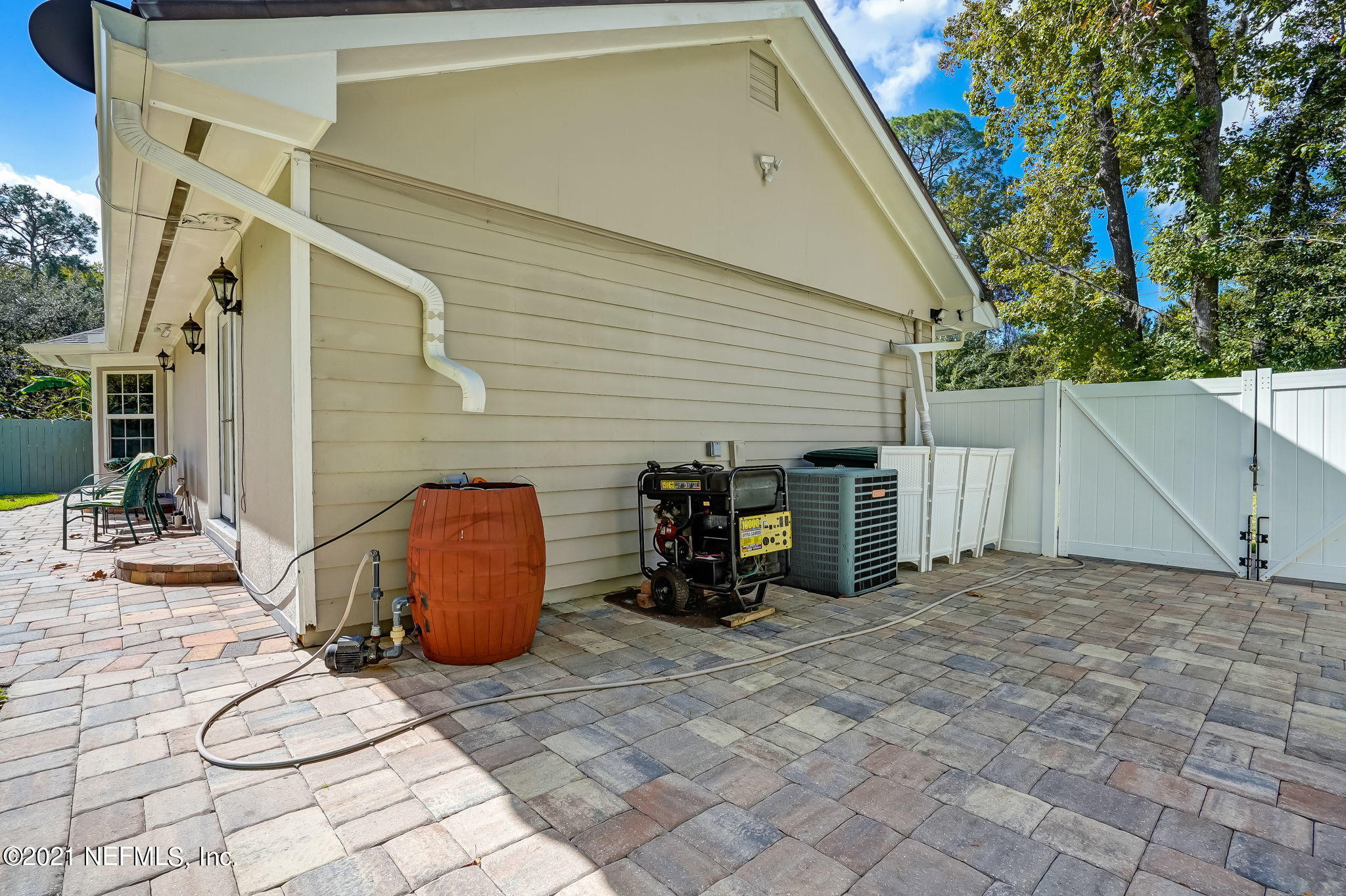 12957 Mandarin Road Jacksonville, FL 32223 - Photo 65 of 83 a backyard of a house with seating space