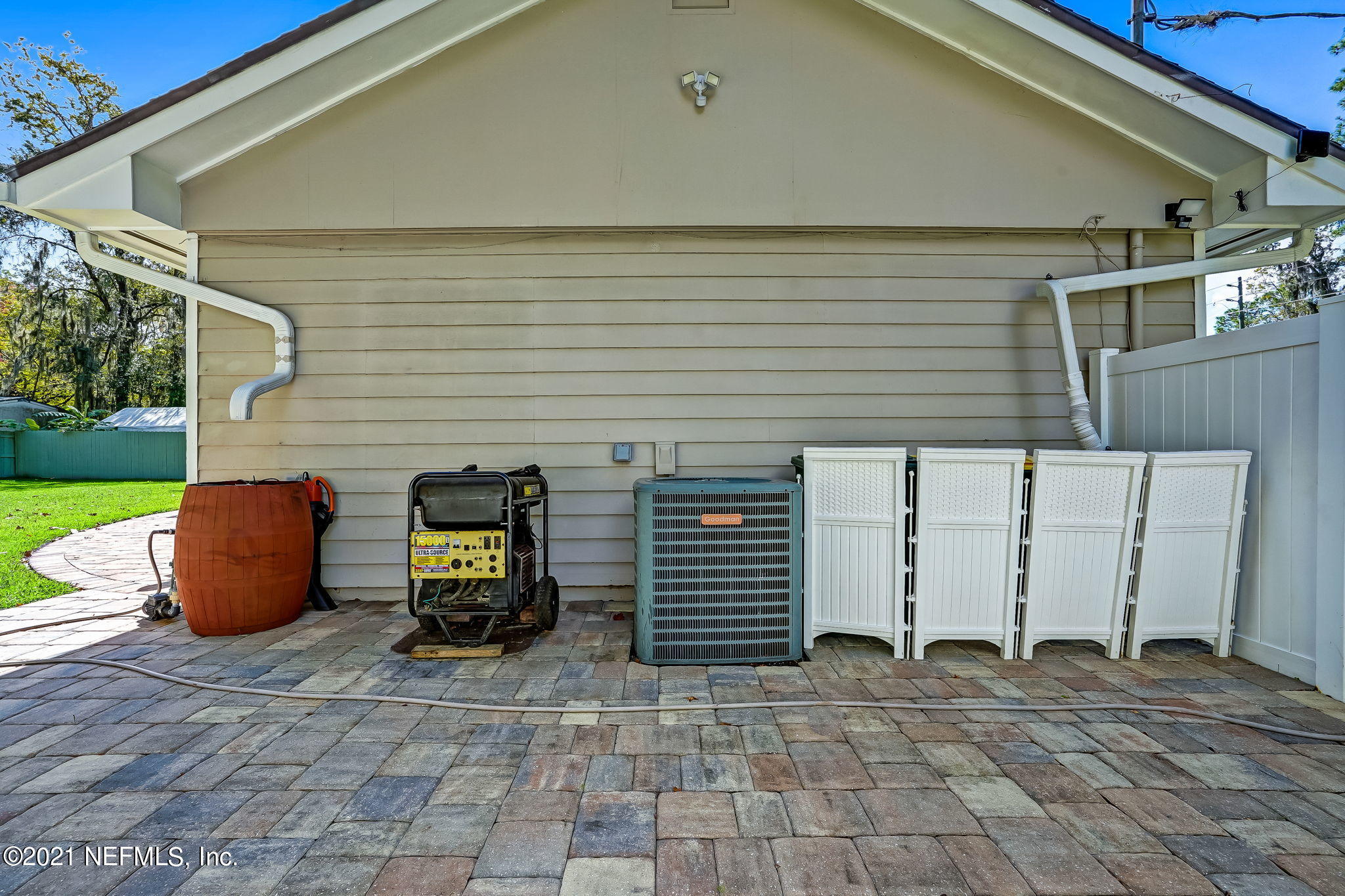 12957 Mandarin Road Jacksonville, FL 32223 - Photo 67 of 83 a view of a patio with table and chairs and a barbeque