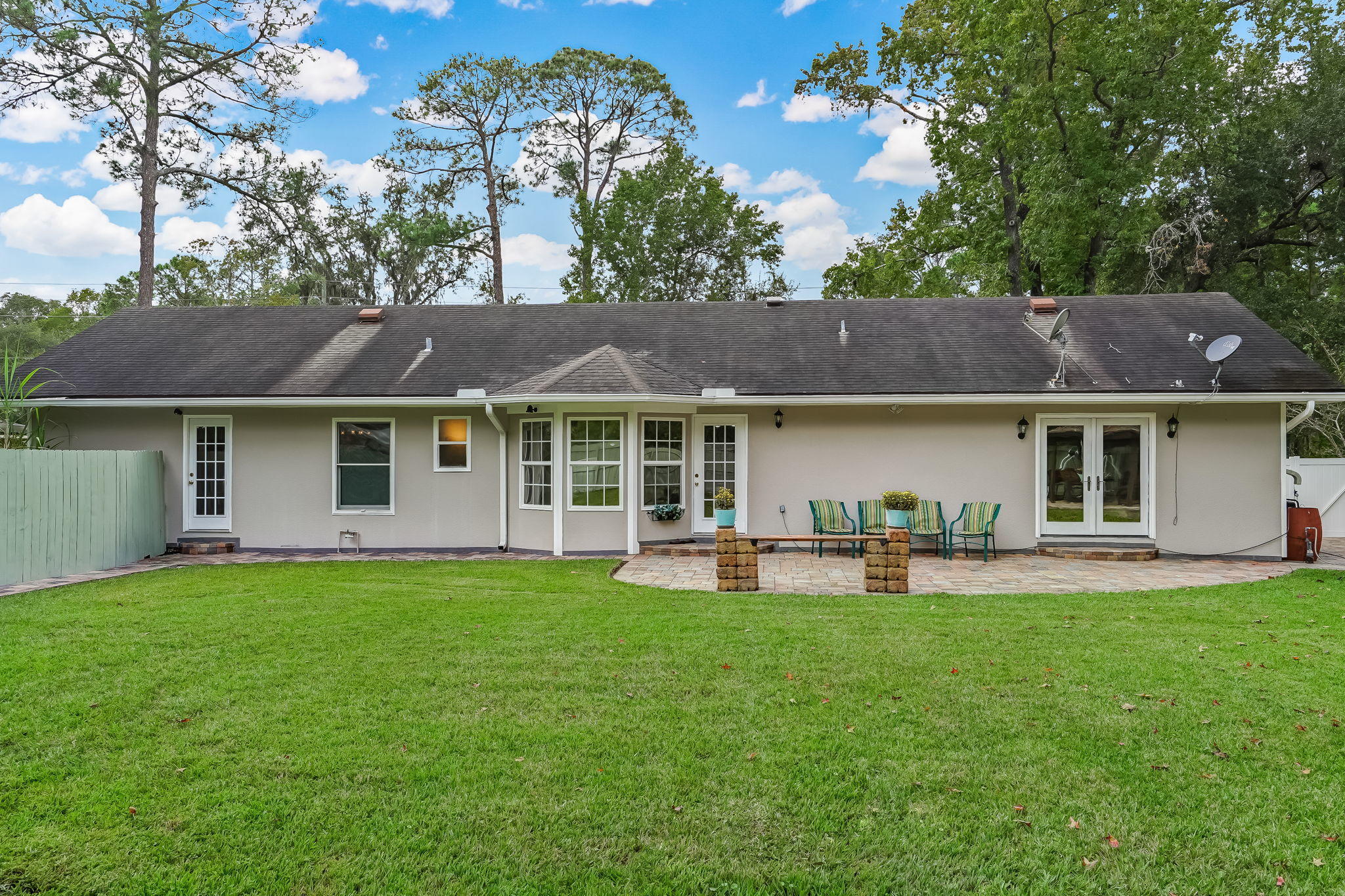 12957 Mandarin Road Jacksonville, FL 32223 - Photo 69 of 83 a front view of house with yard and outdoor seating