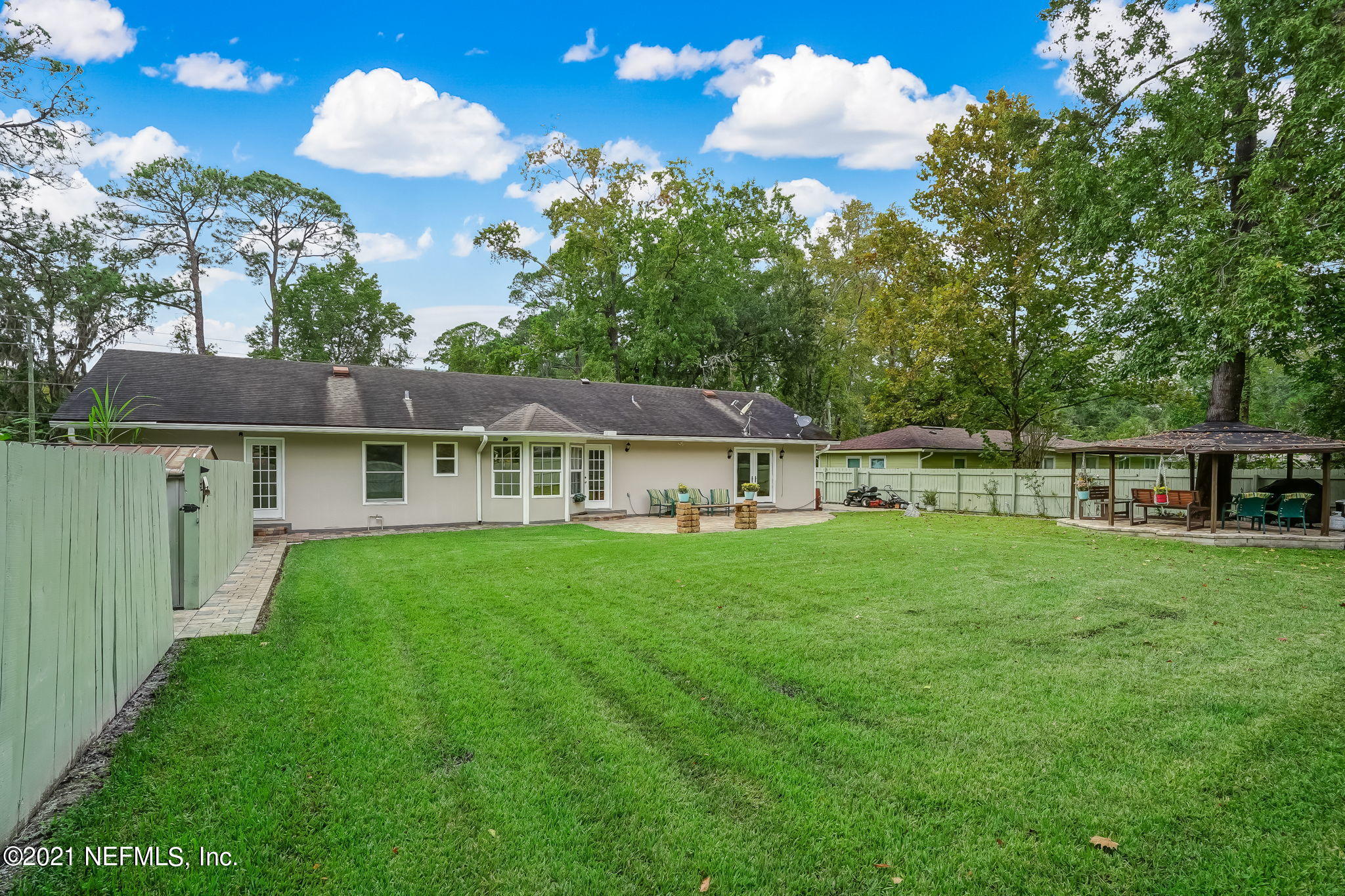 12957 Mandarin Road Jacksonville, FL 32223 - Photo 71 of 83 a view of a house with backyard garden and entertaining space