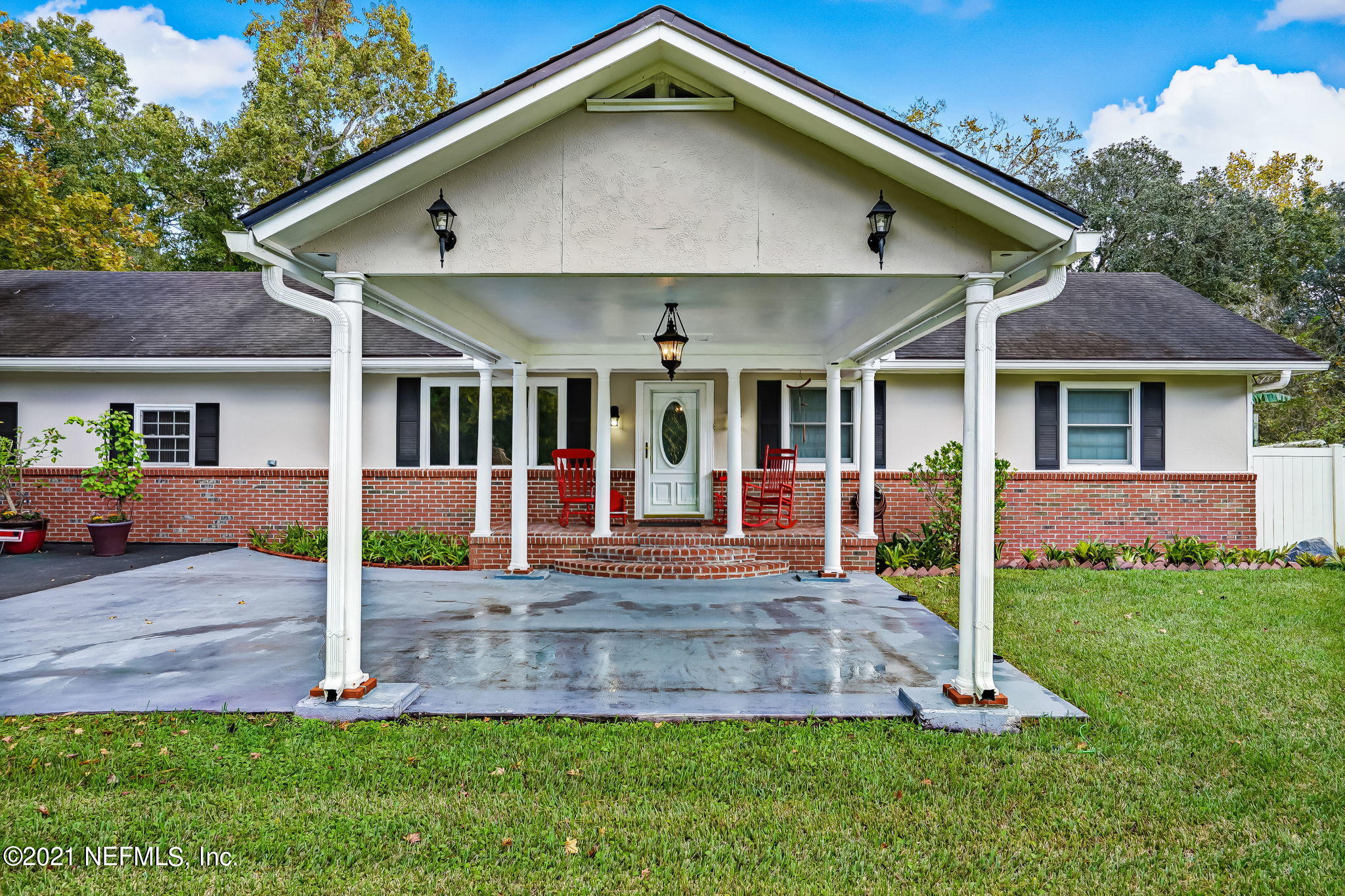 12957 Mandarin Road Jacksonville, FL 32223 - Photo 10 of 83 front view of a house with a yard