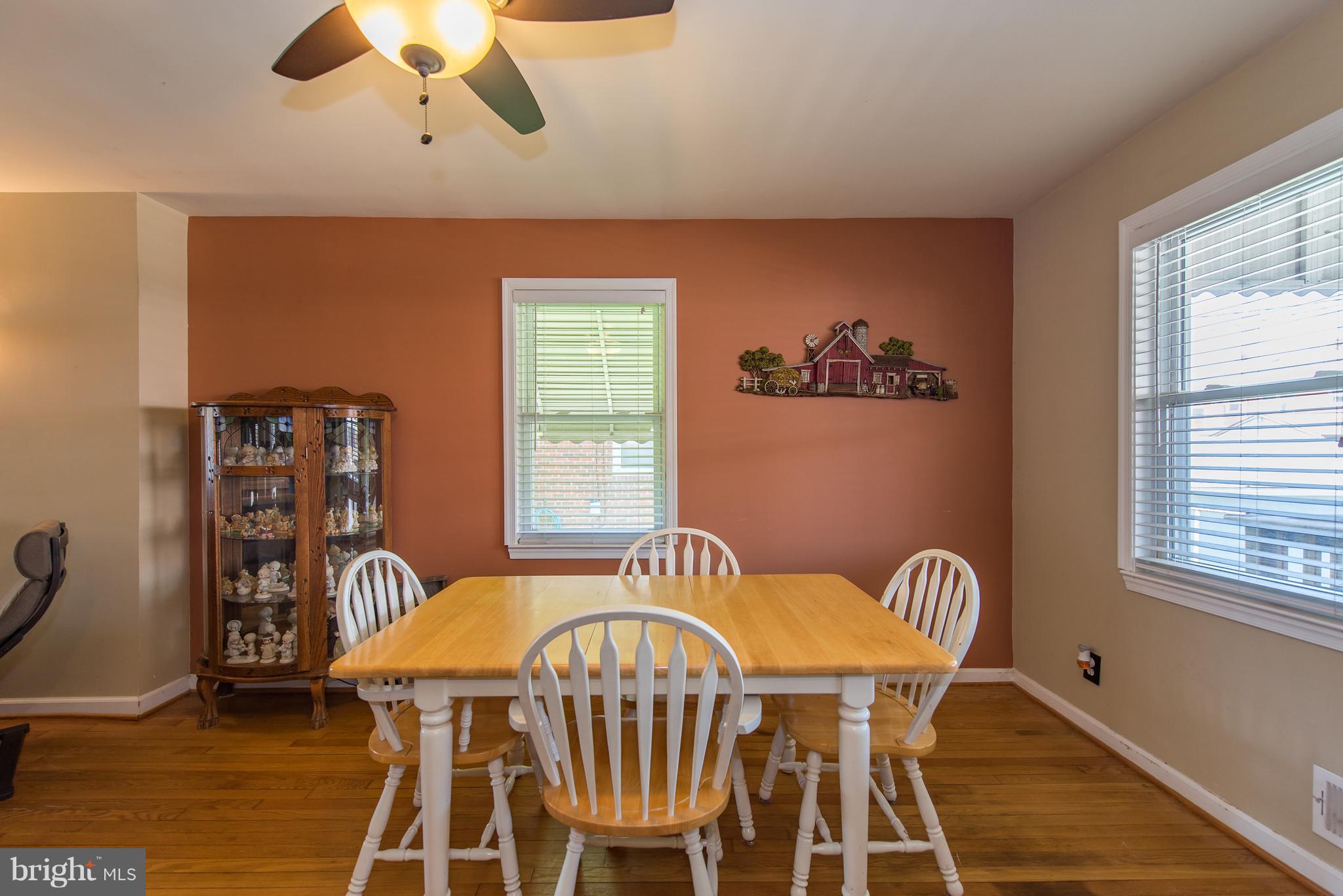2223 Redthorn Road Baltimore, MD 21220 - Photo 9 of 30 a view of a dining room with furniture window and wooden floor