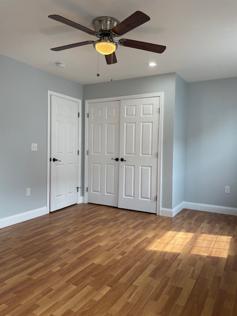 228 State Street, Unit 2 Bristol, RI 02809 - Photo 11 of 19 PRIMARY BEDROOM HAS HARDWOOD FLOORS AND DOUBLE CLOSETS