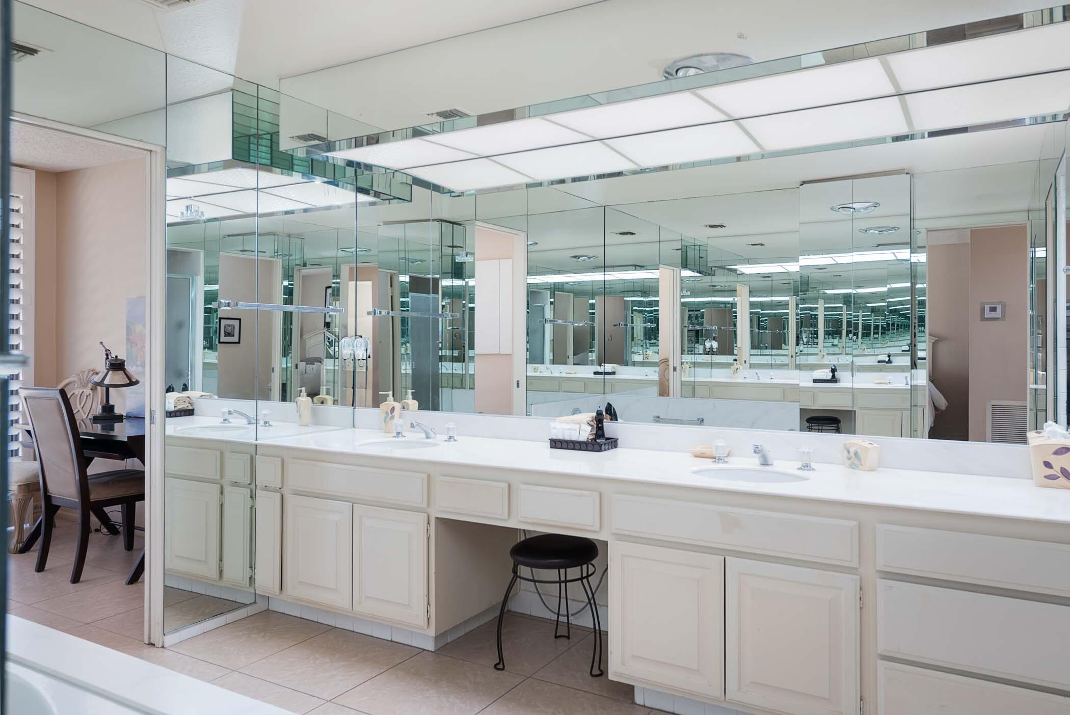 8 Tulane Court Rancho Mirage, CA 92270 - Photo 11 of 31 a bathroom with a sink and a mirror