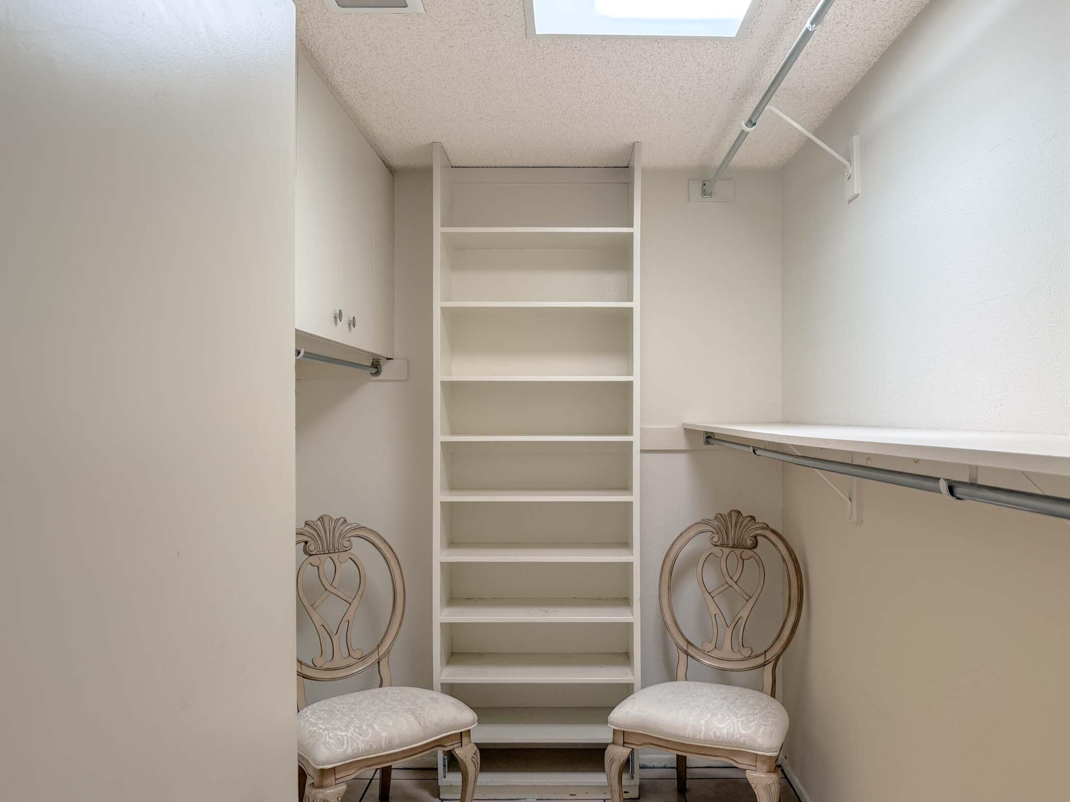 8 Tulane Court Rancho Mirage, CA 92270 - Photo 14 of 31 a view of storage and utility room with racks on the wall