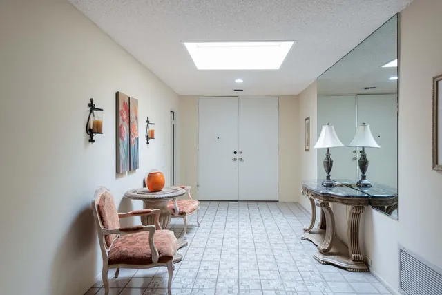 a room with furniture and wooden floor