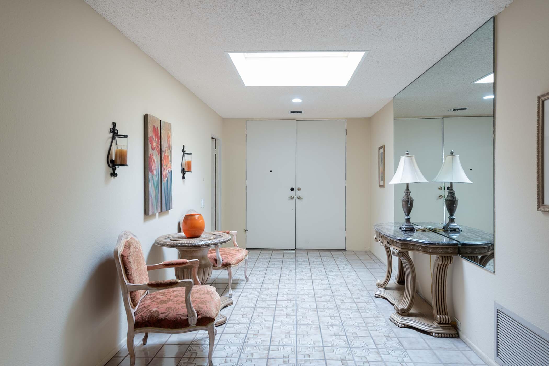 8 Tulane Court Rancho Mirage, CA 92270 - Photo 20 of 31 a room with furniture and wooden floor