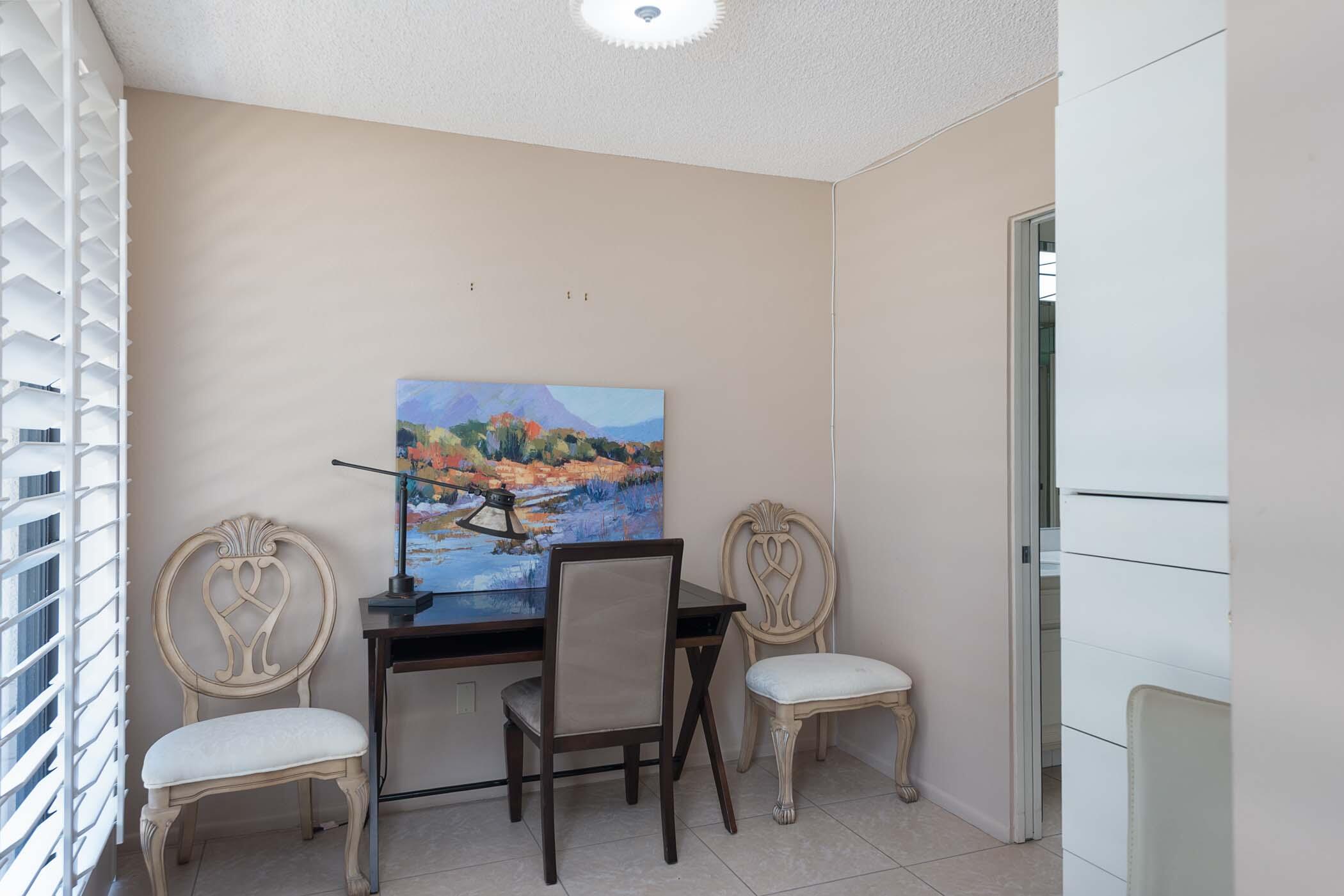 8 Tulane Court Rancho Mirage, CA 92270 - Photo 28 of 31 a dining room with furniture and wooden floor