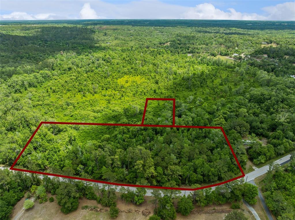 Culbreath Road Brooksville, FL 34602 - Photo 1 of 16 a view of a lush green field