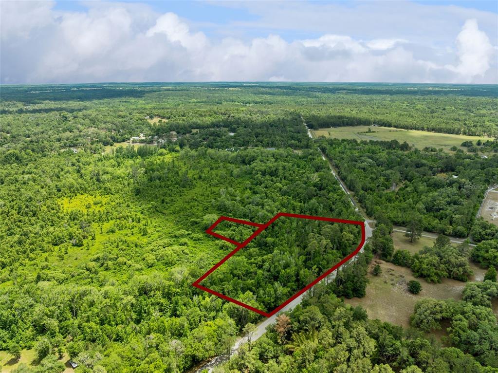 Culbreath Road Brooksville, FL 34602 - Photo 3 of 16 a view of a lush green field