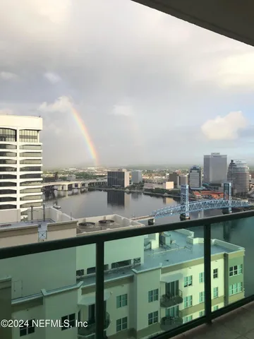 a view of a lake from a balcony