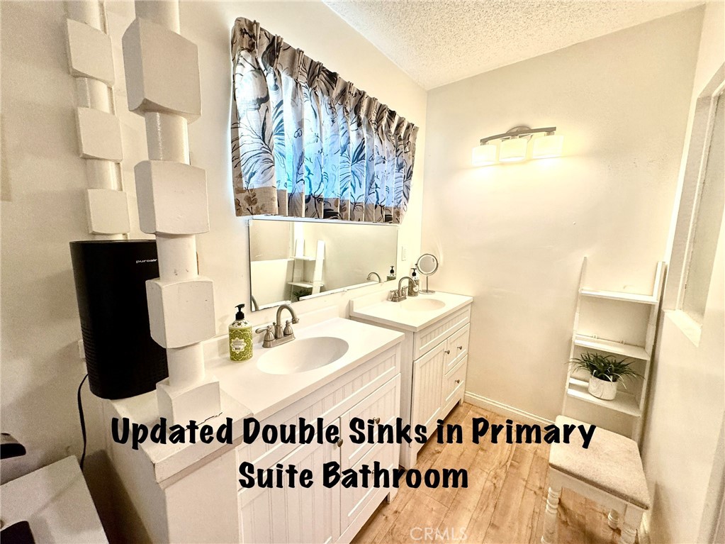 211 Benicia Road Diamond Bar, CA 91765 - Photo 17 of 36 UPDATED DOUBLE SINKS IN PRIMARY SUITE BATHROOM.