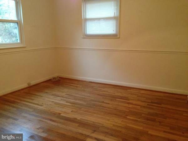 911 Robin Road Silver Spring, MD 20901 - Photo 12 of 15 an empty room with a window