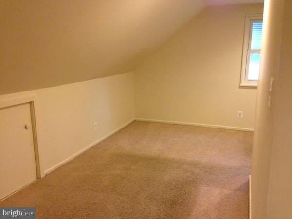 911 Robin Road Silver Spring, MD 20901 - Photo 13 of 15 a view of a room with an empty space