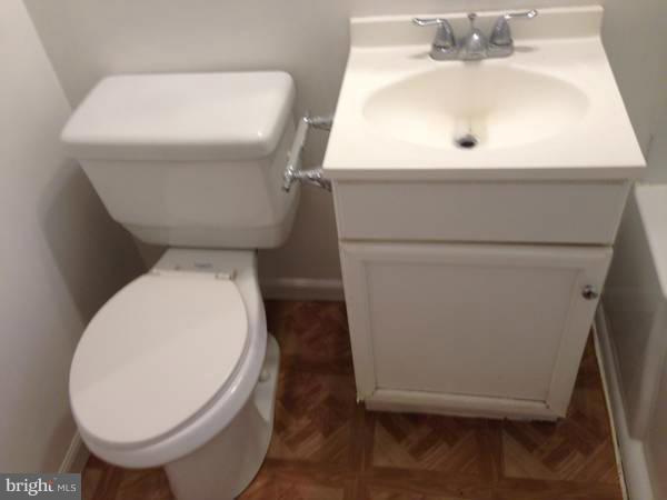 911 Robin Road Silver Spring, MD 20901 - Photo 7 of 15 a close view of a toilet in a bathroom