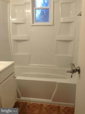 911 Robin Road Silver Spring, MD 20901 - Photo 8 of 15 a bathroom with a shower