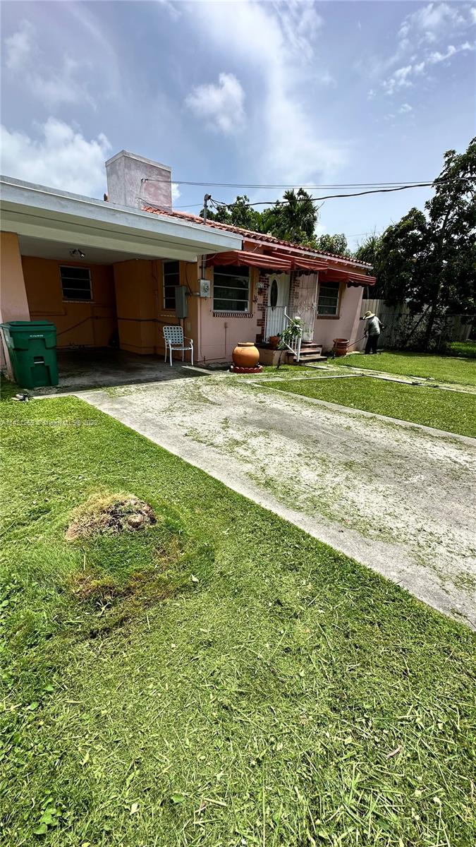 3077 Southwest 5th Street Miami, FL 33135 - Photo 2 of 28 a view of an house with backyard space and balcony