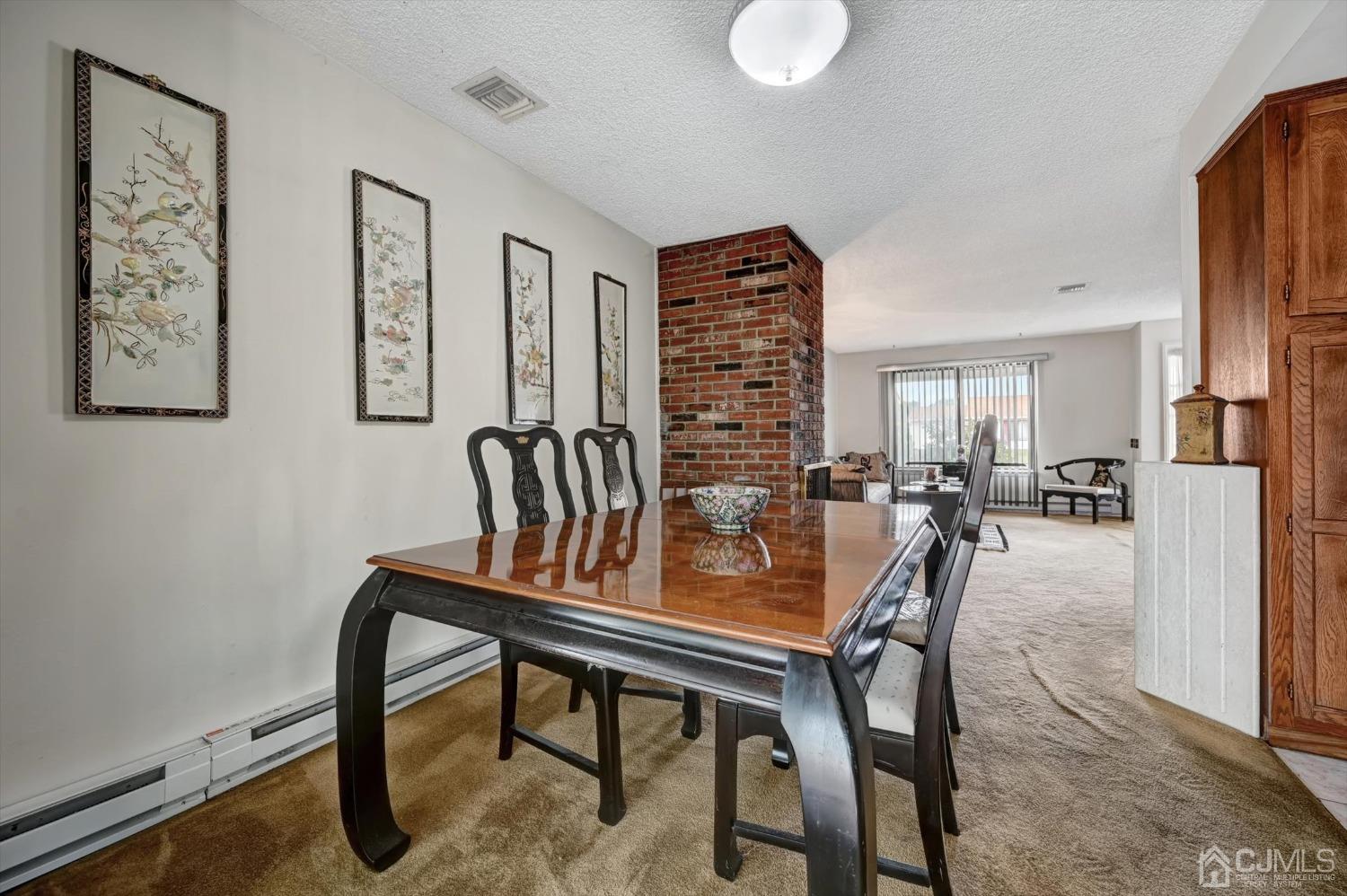 B Haddon Road Monroe Township, NJ 08831 - Photo 7 of 34 a view of a dining room with furniture