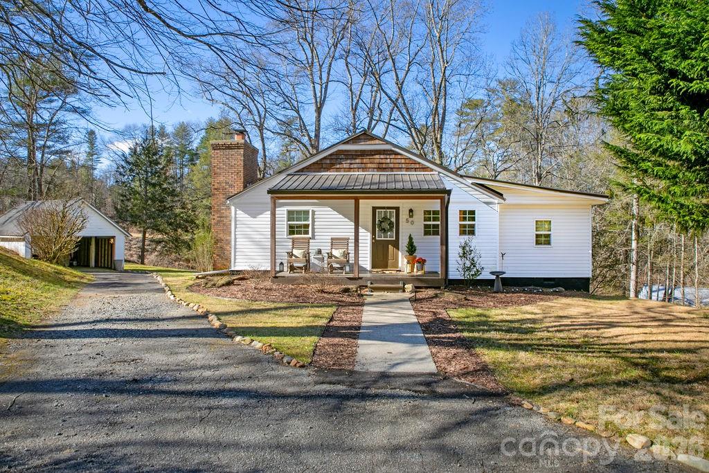 a front view of a house with swimming pool