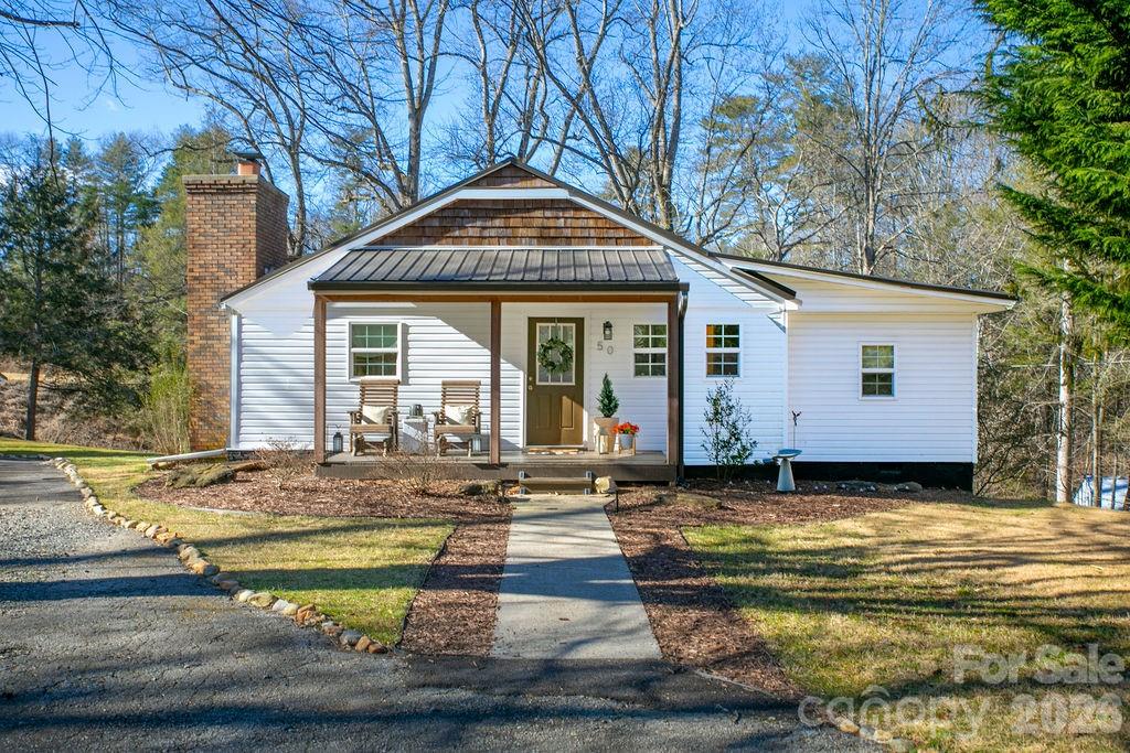 50 Illahee Point Brevard, NC 28712 - Photo 2 of 37 a view of a house with pool and sitting area