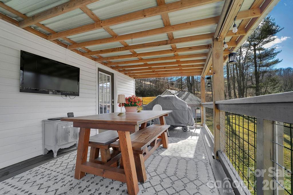 50 Illahee Point Brevard, NC 28712 - Photo 25 of 37 a view of a patio with a tv