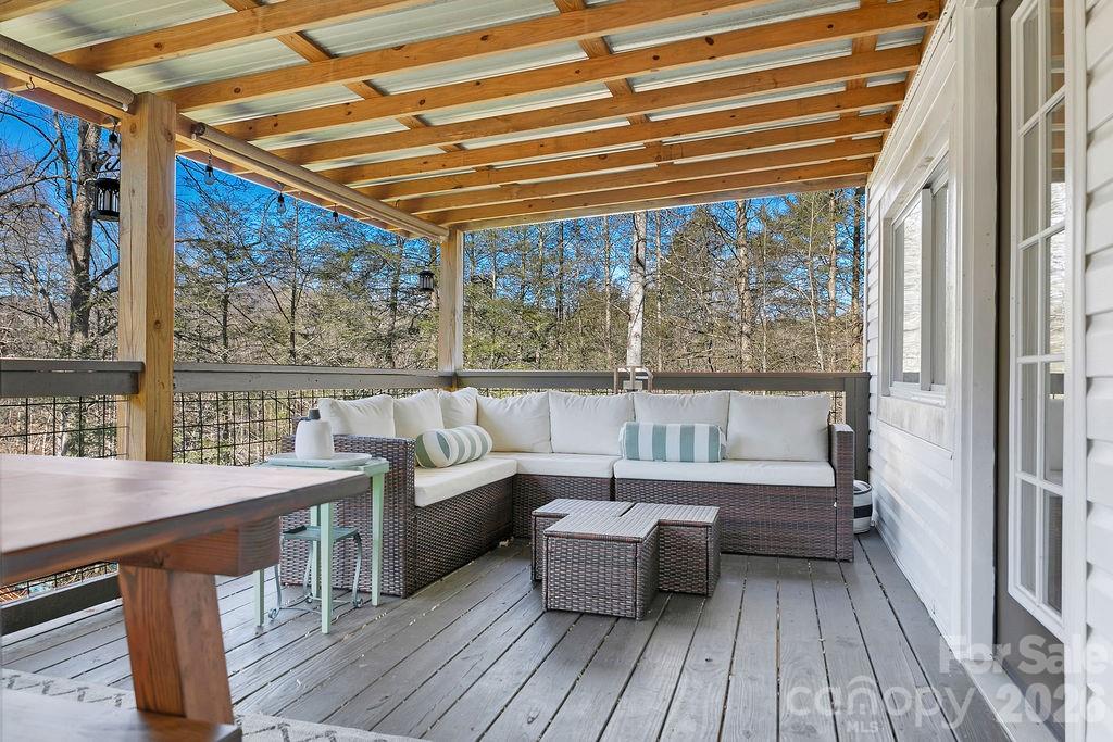 50 Illahee Point Brevard, NC 28712 - Photo 26 of 37 a living room with furniture and a large window