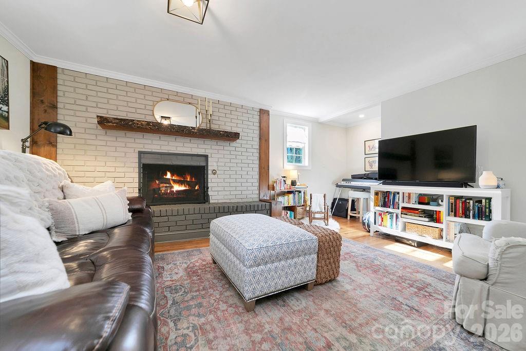 50 Illahee Point Brevard, NC 28712 - Photo 7 of 37 a living room with furniture and a flat screen tv