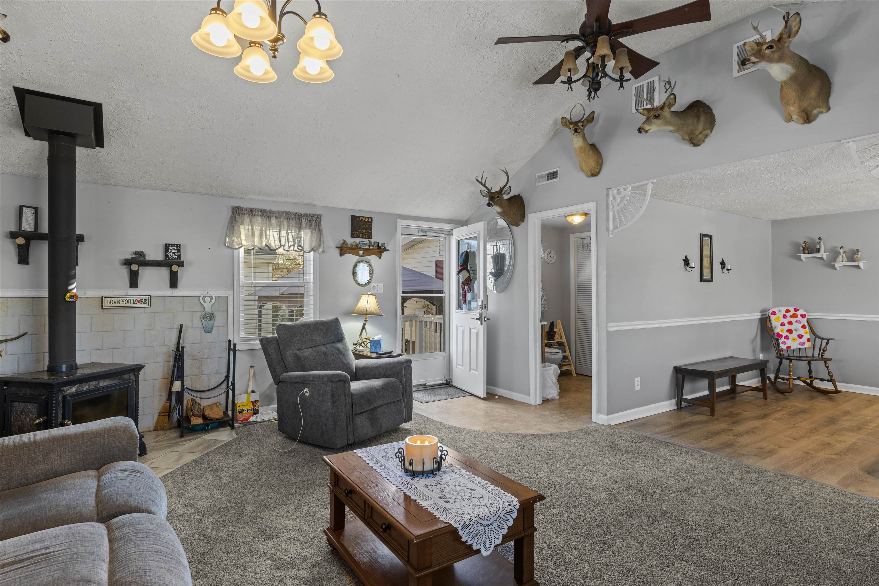 112 East Drumbed Road Villas, NJ 08251 - Photo 12 of 42 a living room with furniture and a chandelier