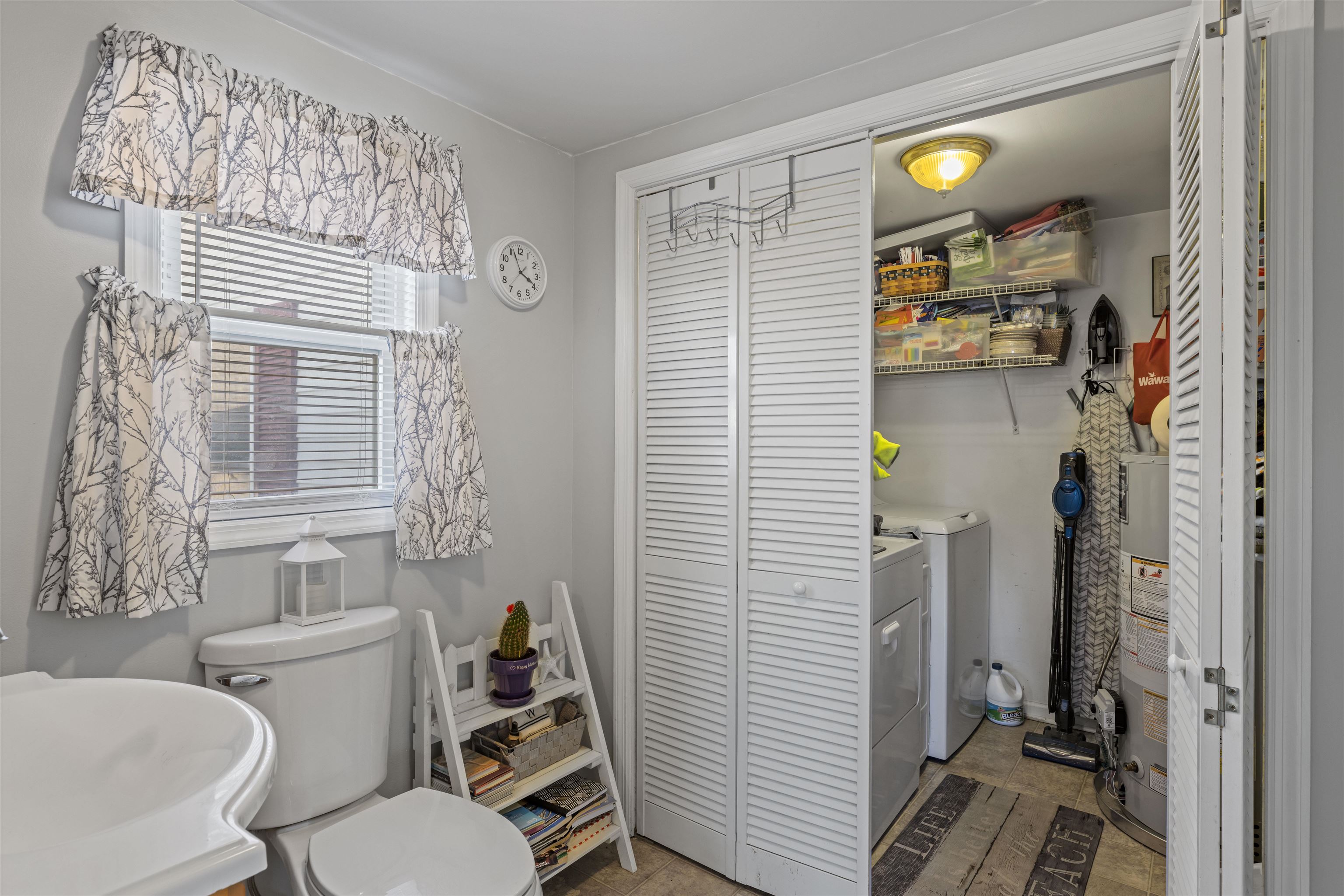 112 East Drumbed Road Villas, NJ 08251 - Photo 13 of 42 a bathroom with a toilet and a shower curtain