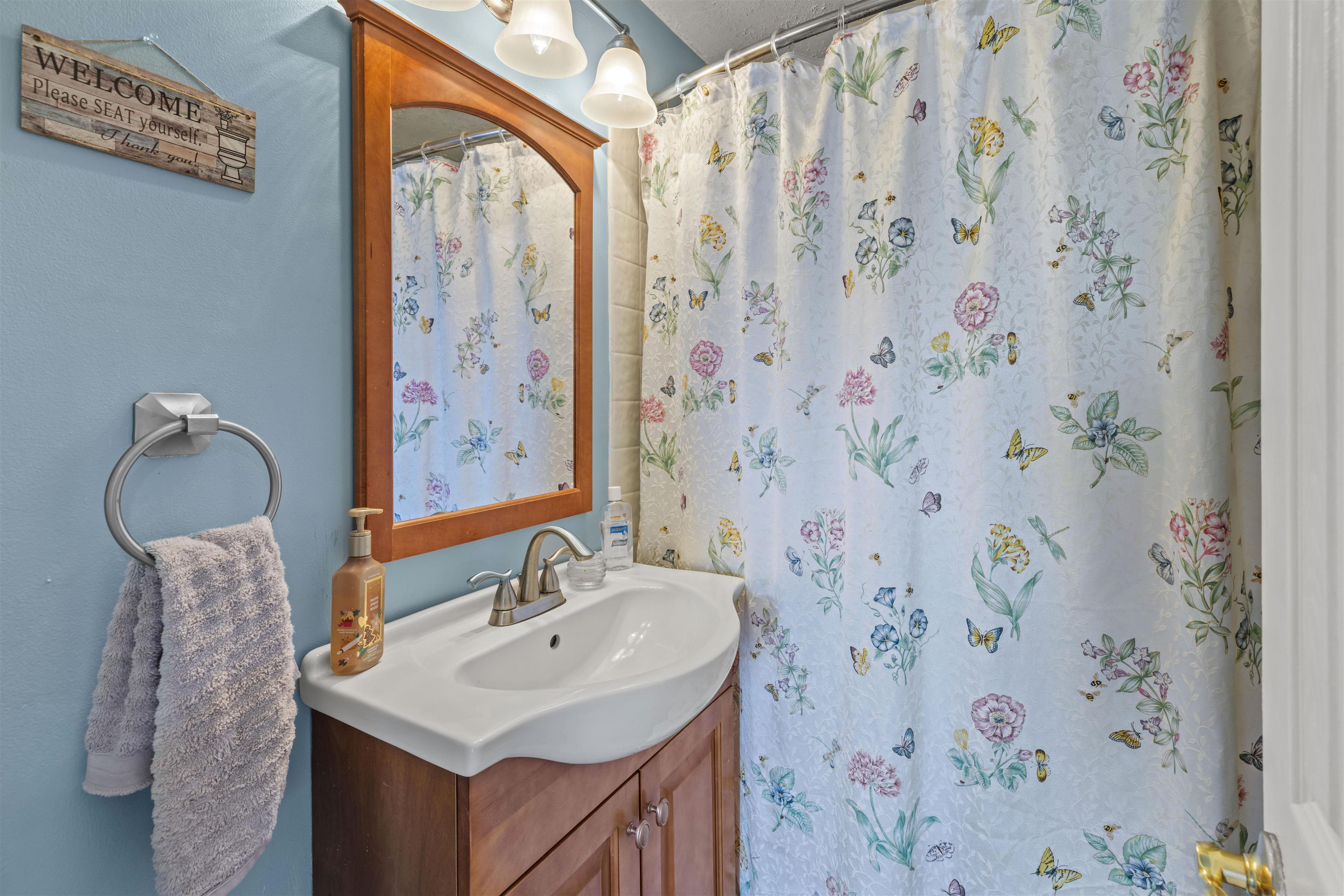 112 East Drumbed Road Villas, NJ 08251 - Photo 19 of 42 a bathroom with a sink and a mirror