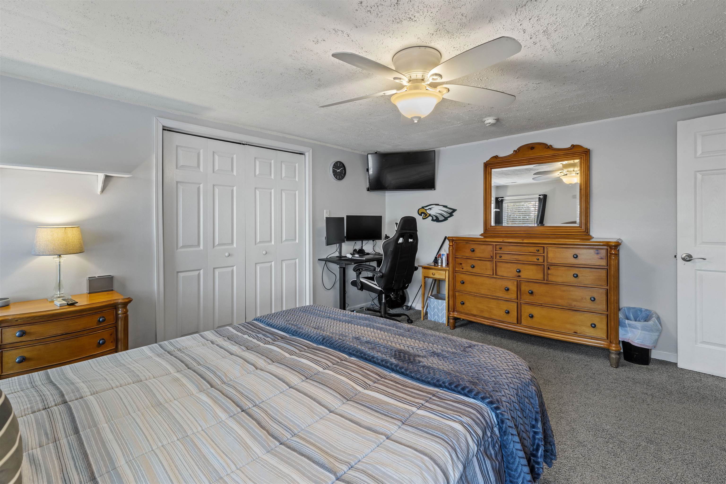 112 East Drumbed Road Villas, NJ 08251 - Photo 21 of 42 a bedroom with a bed and a chandelier