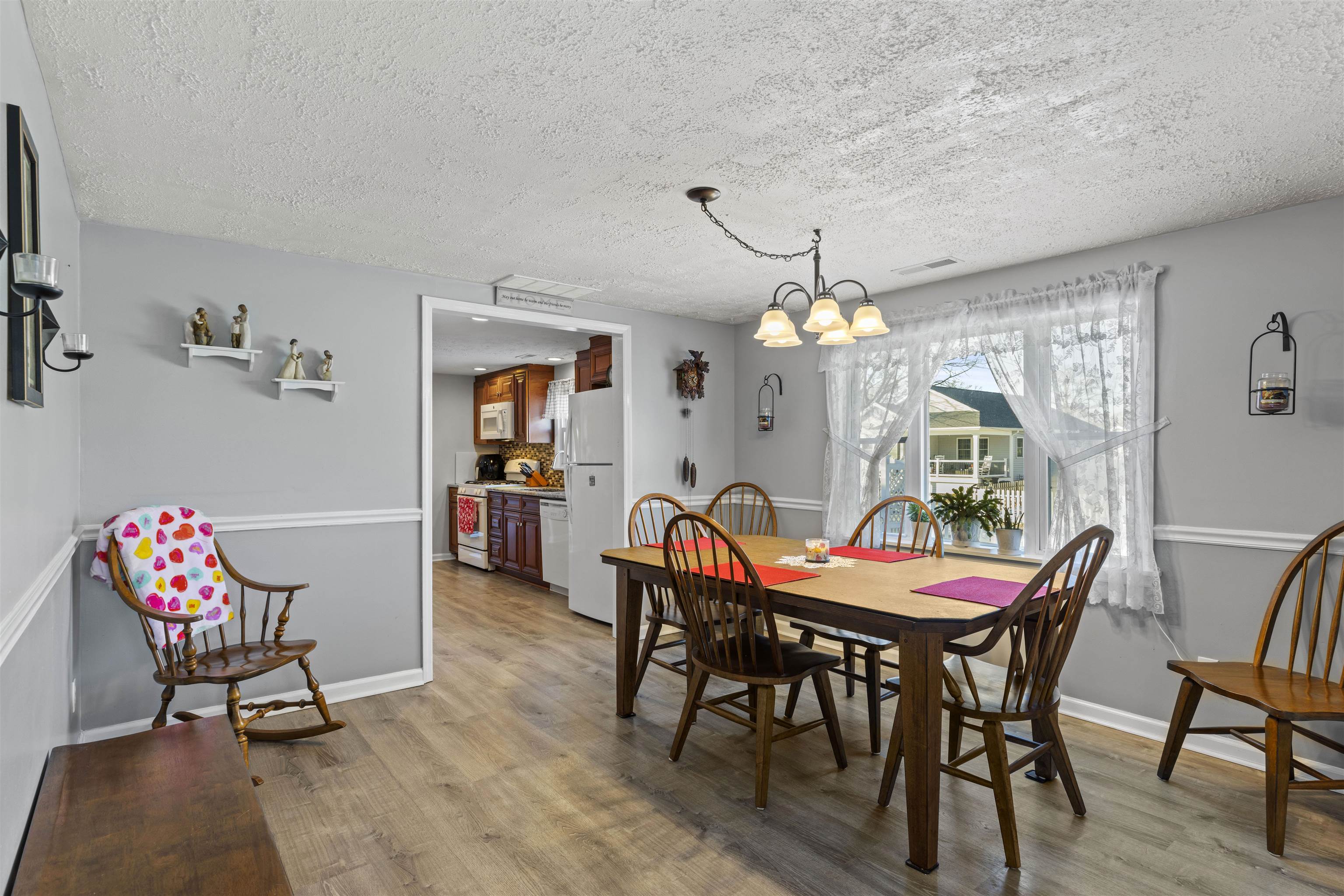 112 East Drumbed Road Villas, NJ 08251 - Photo 9 of 42 a dining room with furniture a chandelier and wooden floor