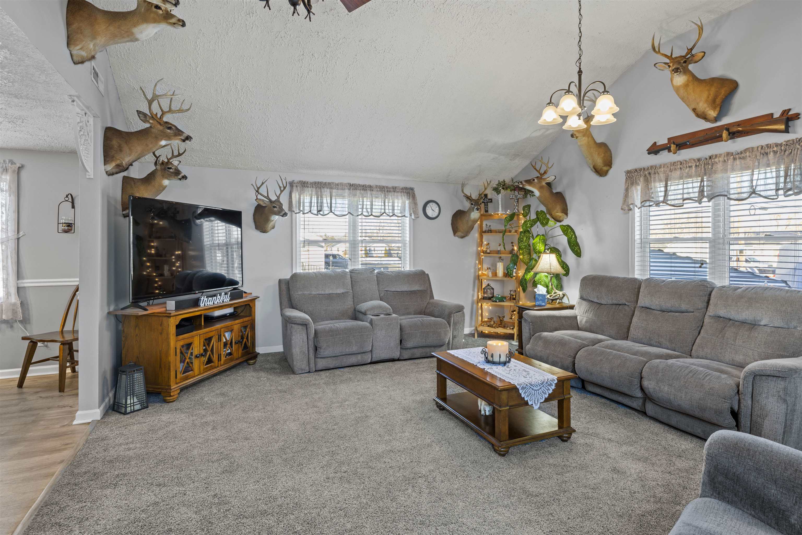 112 East Drumbed Road Villas, NJ 08251 - Photo 10 of 42 a living room with furniture and a chandelier