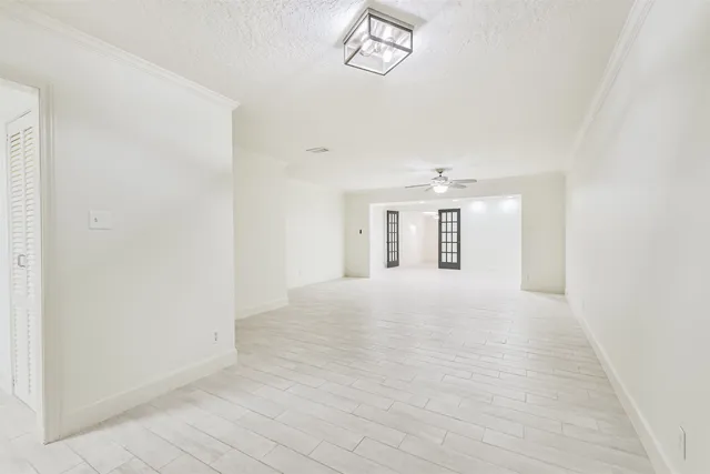 a view of empty room with windows