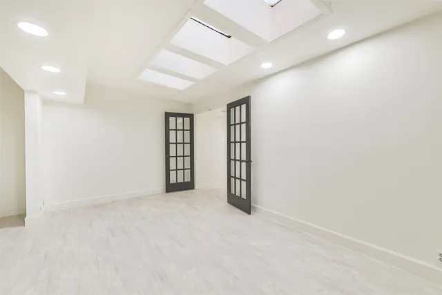 an empty room with windows