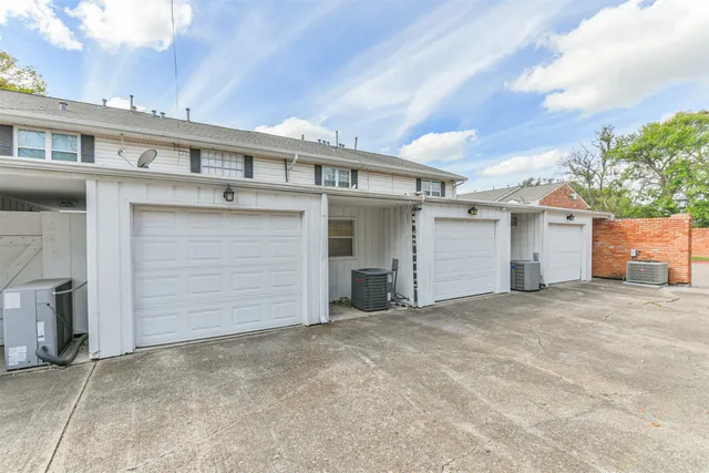 a view of a house with a garage