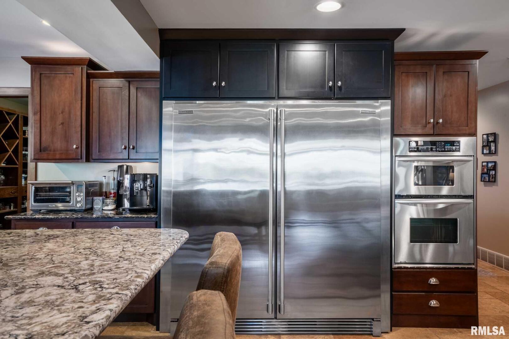 2145 Lick Creek Road Anna, IL 62906 - Photo 11 of 64 a kitchen with a refrigerator and a sink