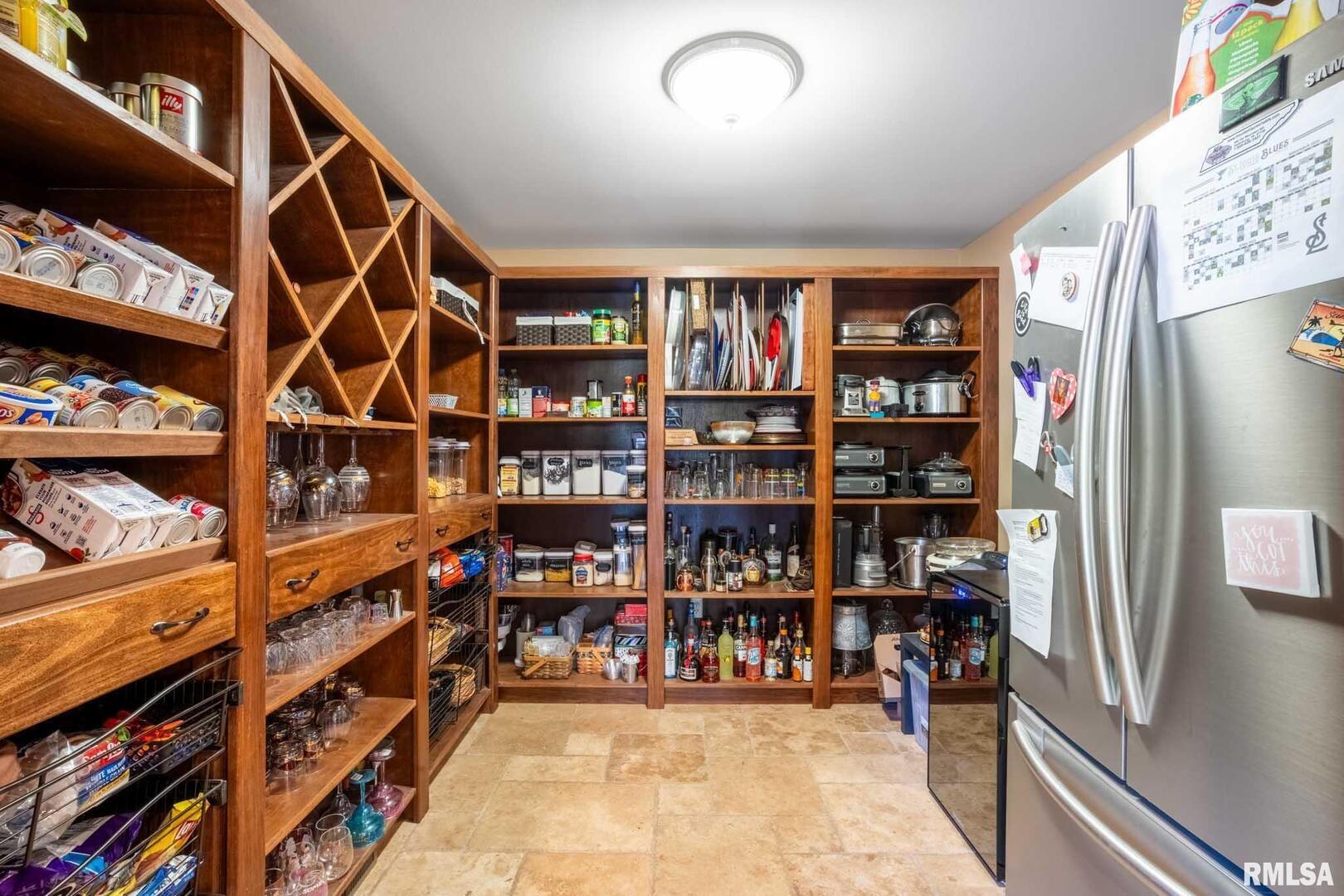 2145 Lick Creek Road Anna, IL 62906 - Photo 13 of 64 a view of an empty room with shelves