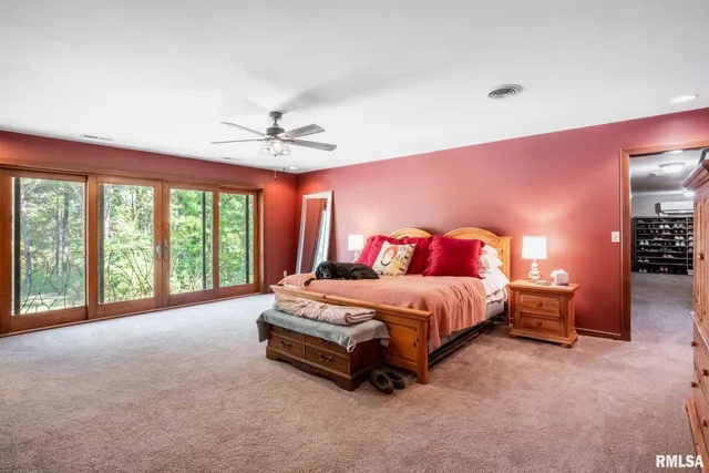 a bathroom with a sink double vanity and a mirror