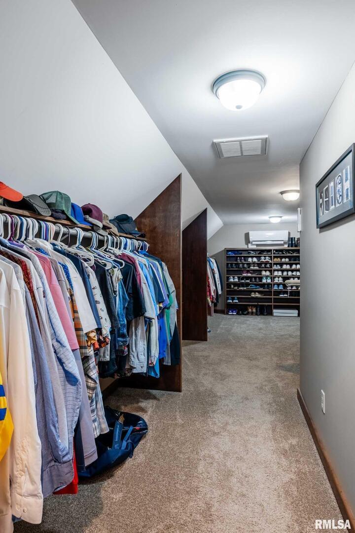 2145 Lick Creek Road Anna, IL 62906 - Photo 20 of 64 a view of walk in closet with clothes and shoes