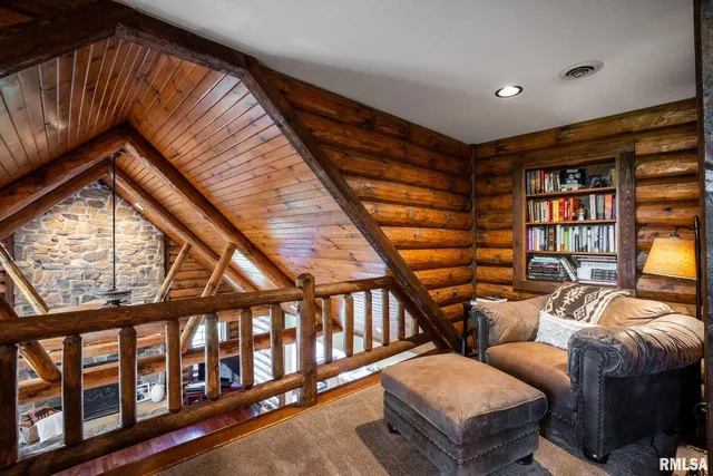 a view of a big house with a big yard and potted plants