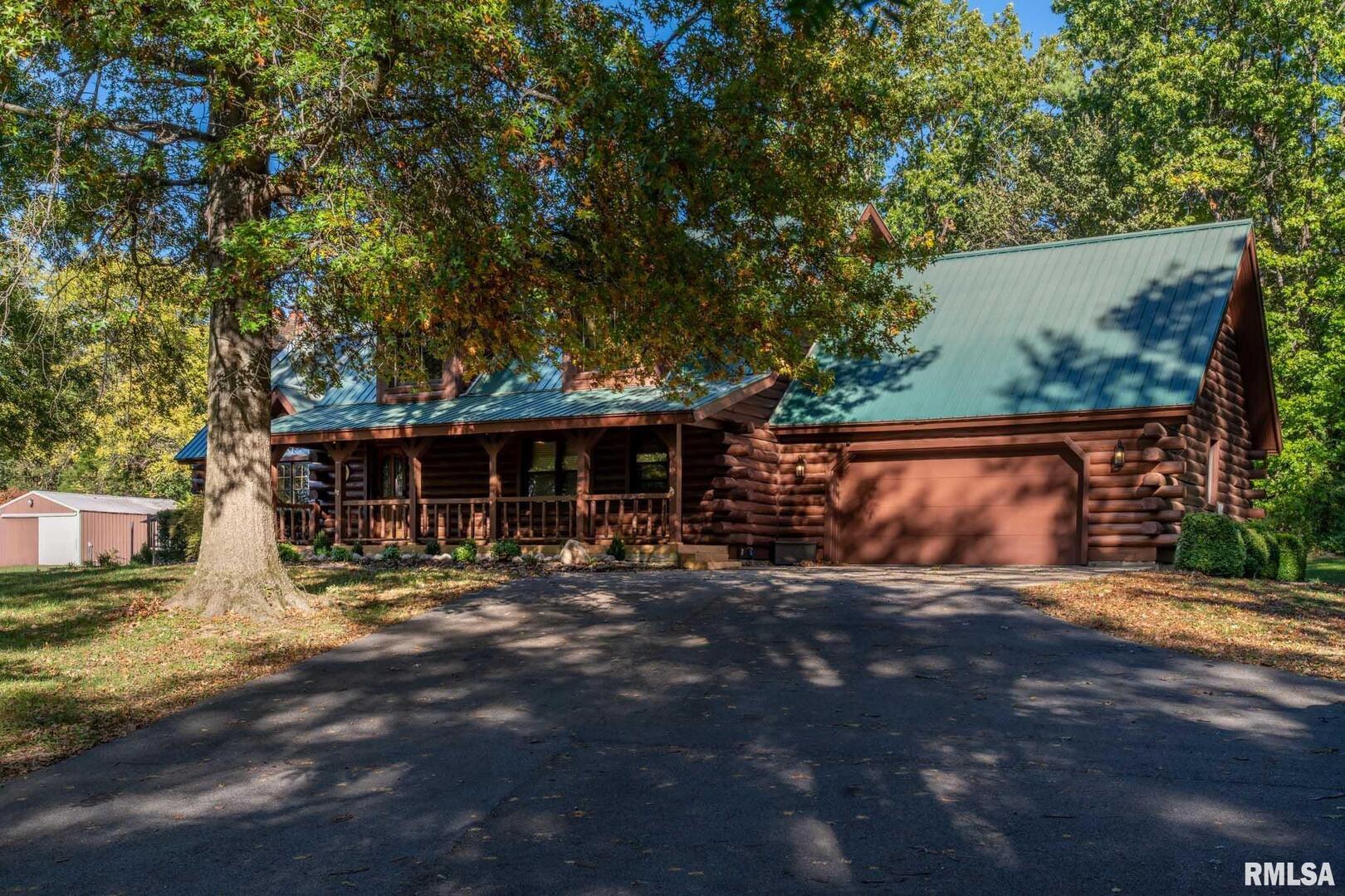 2145 Lick Creek Road Anna, IL 62906 - Photo 47 of 64 a view of a house with large tree