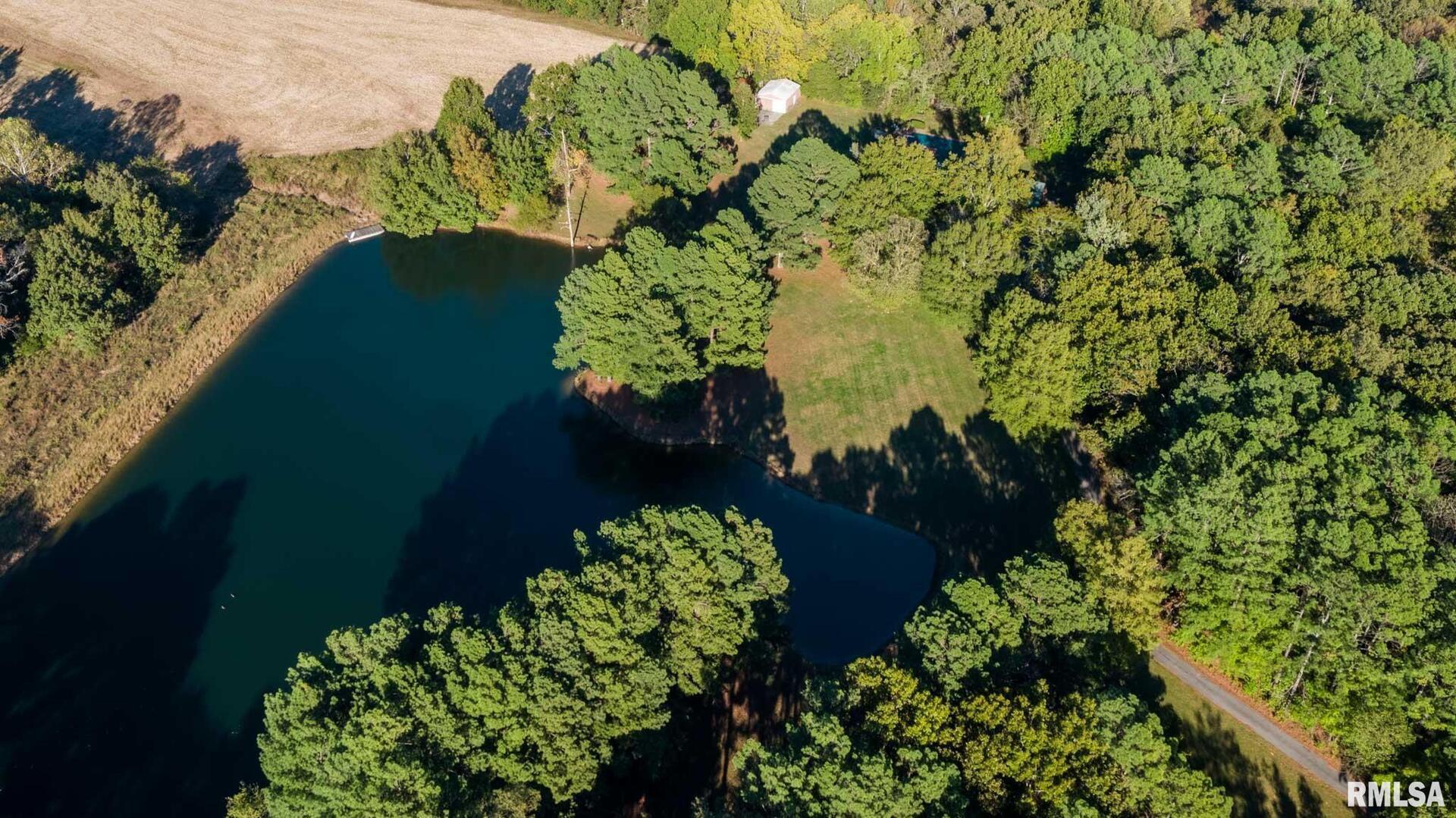 2145 Lick Creek Road Anna, IL 62906 - Photo 58 of 64 a view of a garden with a flower garden