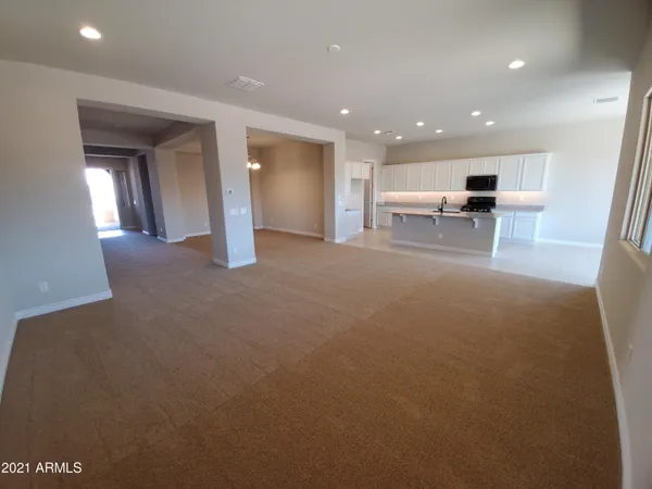 a view of a livingroom with a staircase