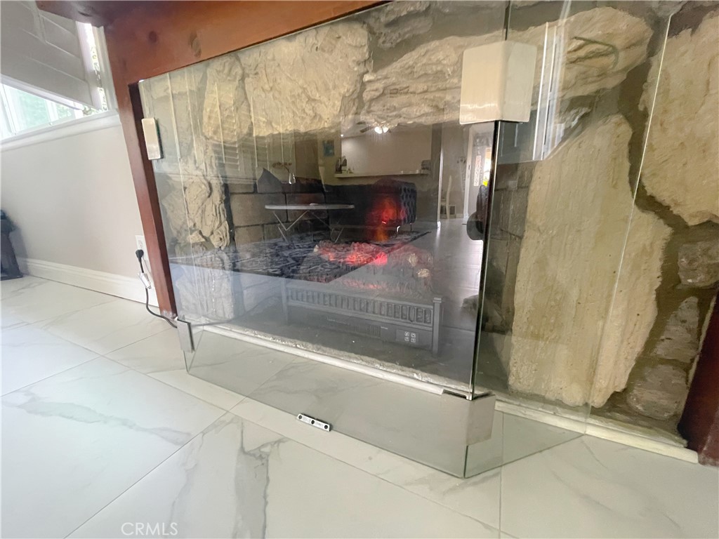 20311 Flintgate Drive Walnut, CA 91789 - Photo 18 of 32 a bathroom with a glass shower door