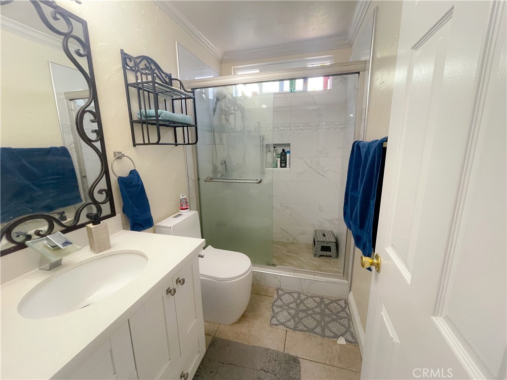 20311 Flintgate Drive Walnut, CA 91789 - Photo 21 of 32 a bathroom with a sink toilet and shower