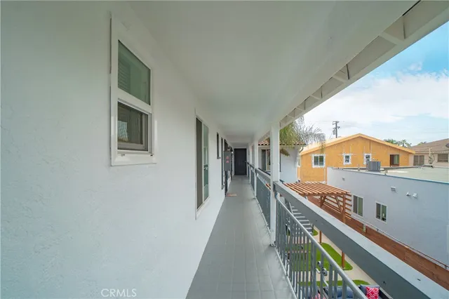 a view of a balcony with chairs