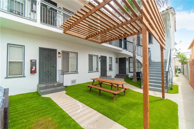 a backyard of a house with seating space